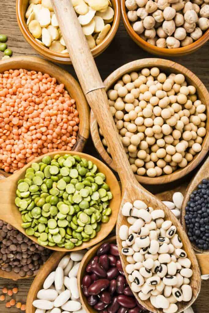 composition of dry legumes of different types, color and flavor in the foreground