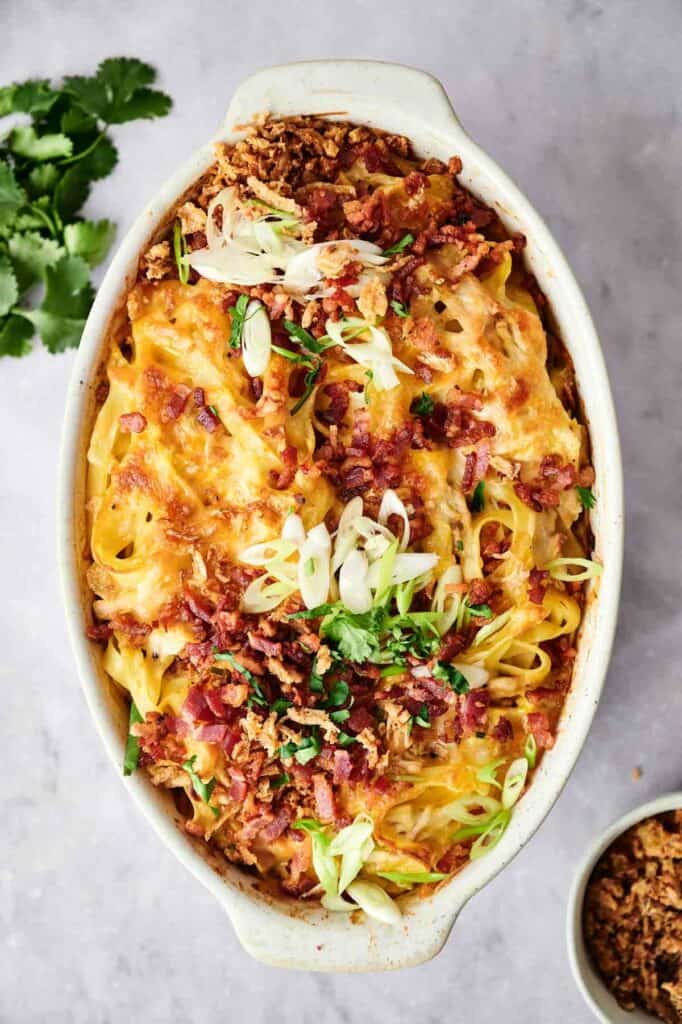 A chicken casserole dish filled with pasta and chicken.
