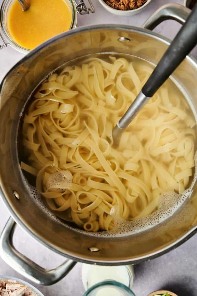 A pot with pasta for a chicken casserole recipe.