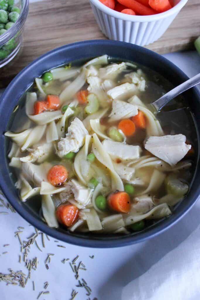 A bowl of chicken noodle soup.