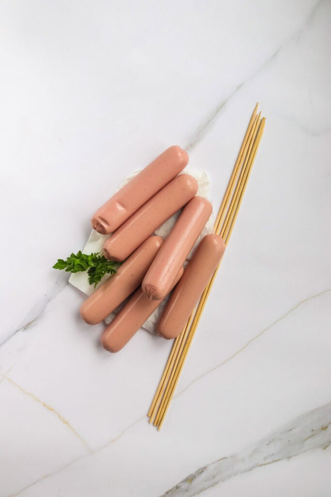 hotdogs with sticks
