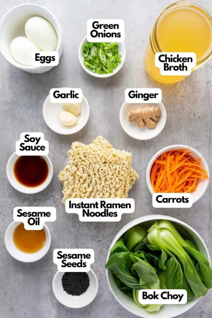 Ingredients for an elevated Asian-style ramen noodles neatly organized and labeled on a kitchen countertop.