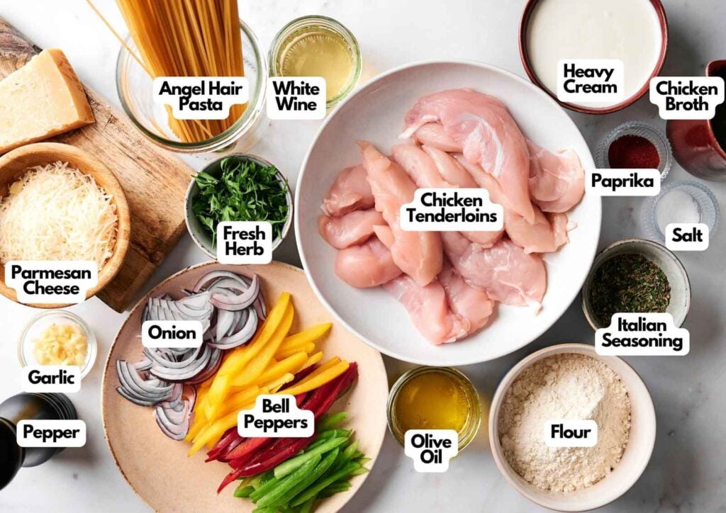 A variety of labeled ingredients for a chicken scampi pasta dish, including chicken tenderloins, pasta, vegetables, herbs, spices, cream, broth, flour, cheese, oil, and wine, arranged on a table.