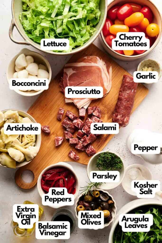 Experience the vibrant flavors of our antipasto salad, featuring a delightful medley of lettuce, cherry tomatoes, bocconcini, prosciutto, salami, garlic, artichokes, red peppers, parsley, arugula, and olives. A drizzle of oil and vinegar with a pinch of salt and pepper brings it all together.