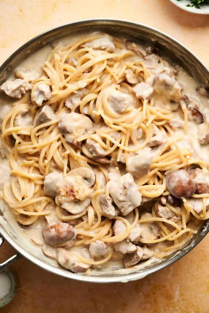A skillet filled with spaghetti, sliced mushrooms, and tender pieces of chicken or turkey is coated in a luscious creamy white sauce&mdash;reminiscent of classic Turkey Tetrazzini.