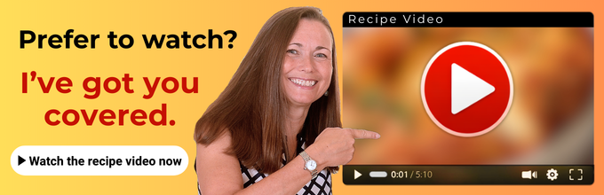 Smiling woman pointing at a large video player icon next to text offering a recipe video option.